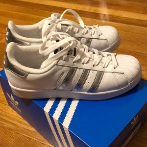 White and silver stripe adidas superstars